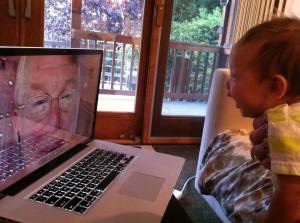 Malcolm Gault-Williams and his first grandchild on Skype video call